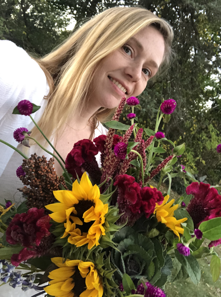 Sara Lovetere holding farm fresh flowers